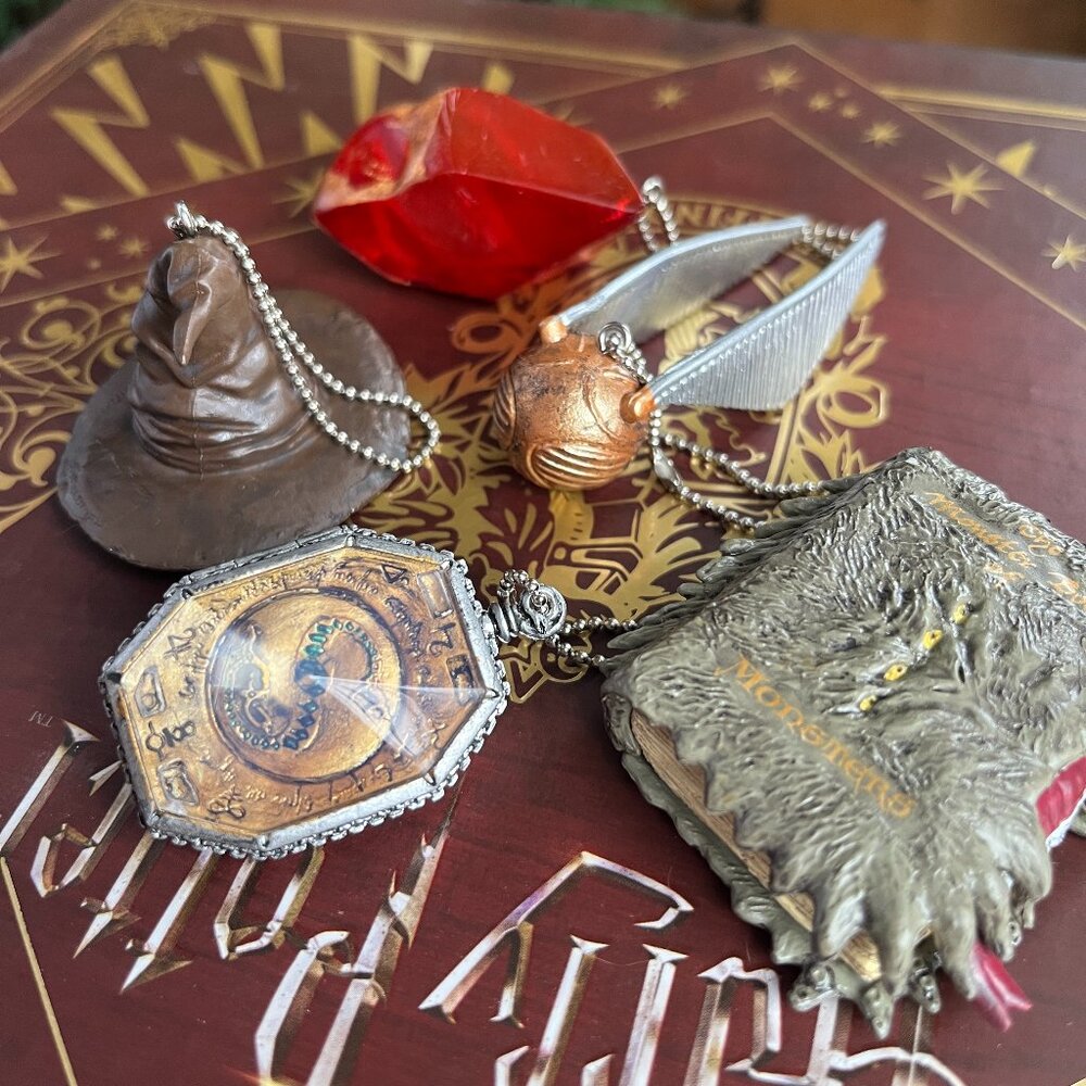 Bundle of 5 harry potter gachapon toys (golden snitch, locket, sorting hat, mons